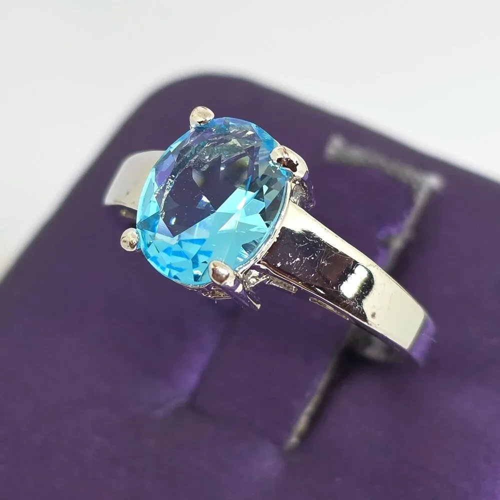 Beautiful Silver Oval Faceted Light Blue Rhodium Plated Solitaire Ring Sz 6.75